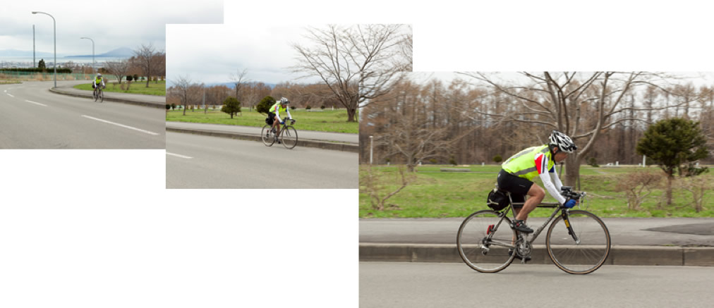 自転車に乗って走る片桐学長