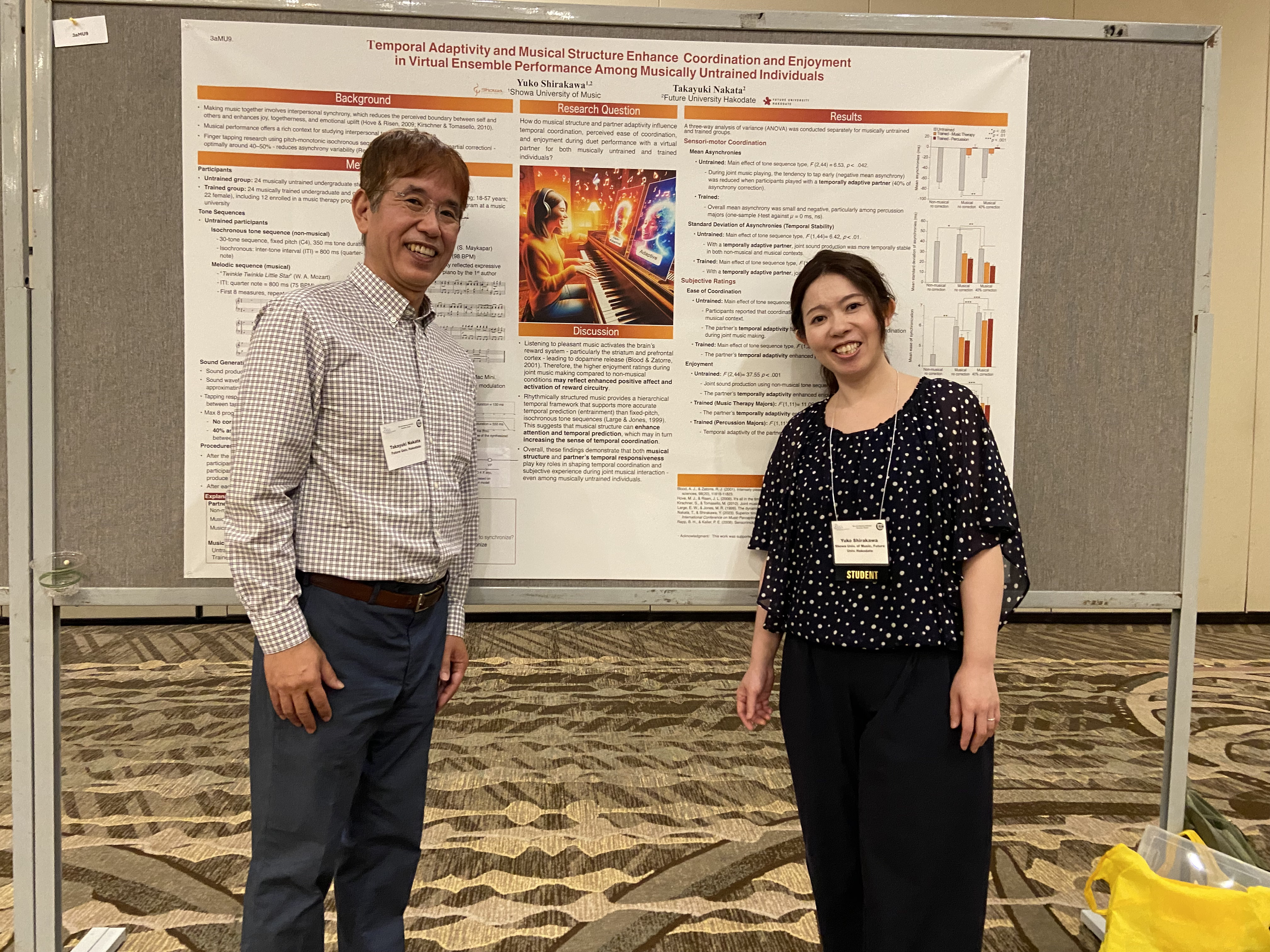 Image of Yuko Shirakawa, a third-year doctoral student, receiving the Best Student Poster Award from the Acoustical Society of America.